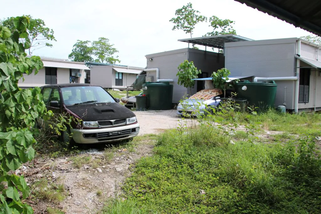 This photograph taken on September 2, 2018 shows a view of dwellings at refugee Camp Four on the Pacific island of Nauru. - A cluster of corrugated iron huts resembling military barracks jut out of Nauru's sweltering rocky landscape to reveal refugee settlement camp number five, a place defined by desperation and rarely visited by outsiders. (MIKE LEYRAL/AFP/Getty Images)