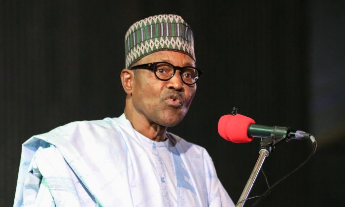 Nigerian President Muhammadu Buhari addresses the audience following the announcement of Nigeria’s election results on Feb. 27, 2019. (Kola Sulaimon/AFP/Getty Images)