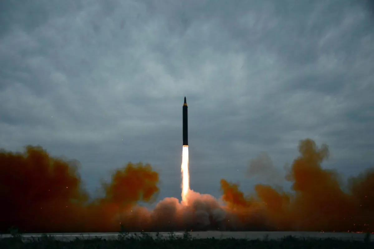 This picture from North Korea's official Korean Central News Agency (KCNA) taken on Aug. 29, 2017 and released on August 30, 2017 shows North Korea's intermediate-range strategic ballistic rocket Hwasong-12 lifting off from the launching pad at an undisclosed location near Pyongyang. (STR/AFP/Getty Images)