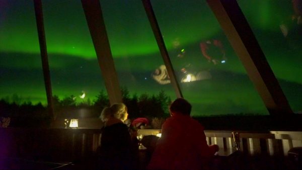 Tourists watching Northern Lights