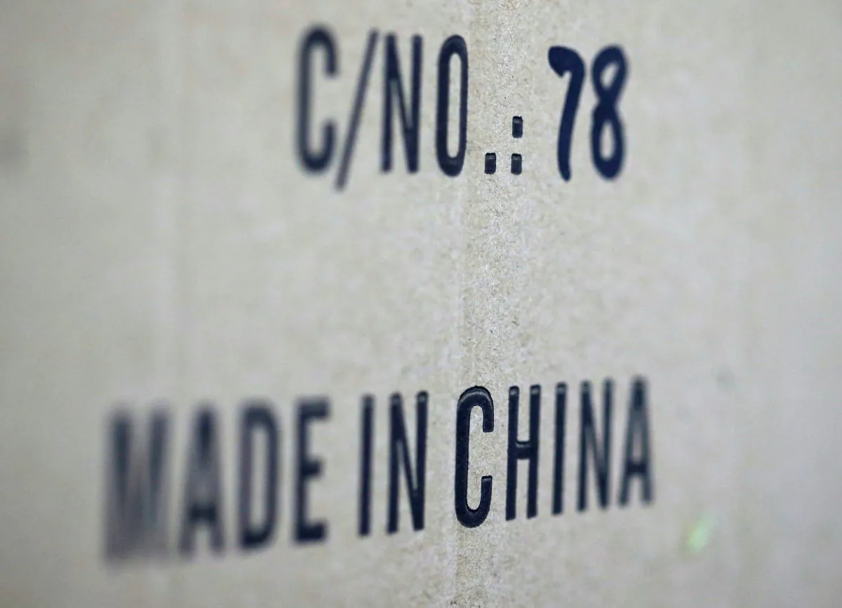 Words 'Made in China' are pictured on a box of products imported from China at a wholesale shop in Paris, France. (Regis Duvignau/Reuters)