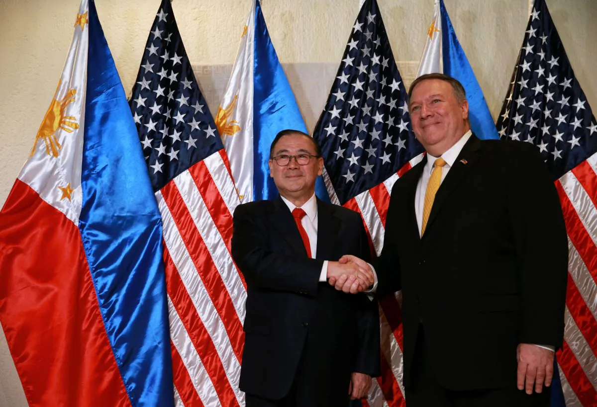 U.S. Secretary of State Mike Pompeo shake hands with Philippines Foreign Secretary Teodoro Locsin Jr. at the Department of Foreign Affairs in Pasay City, Metro Manila, Philippines on March 1, 2019. (Eloisa Lopez/Reuters)