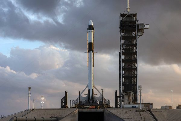 The SpaceX Falcon 9 rocket and Crew Dragon spacecraft is rolled out to Launch Complex 39A