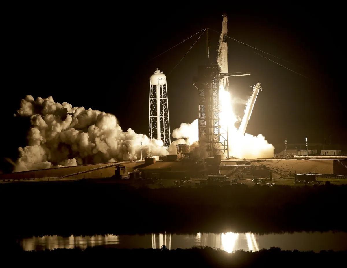 A SpaceX Falcon 9 rocket with a demo Crew Dragon spacecraft on an uncrewed test flight to the International Space Station lifts off from pad 39A at the Kennedy Space Center in Cape Canaveral, Fla., on March 2, 2019. (John Raoux/AP)