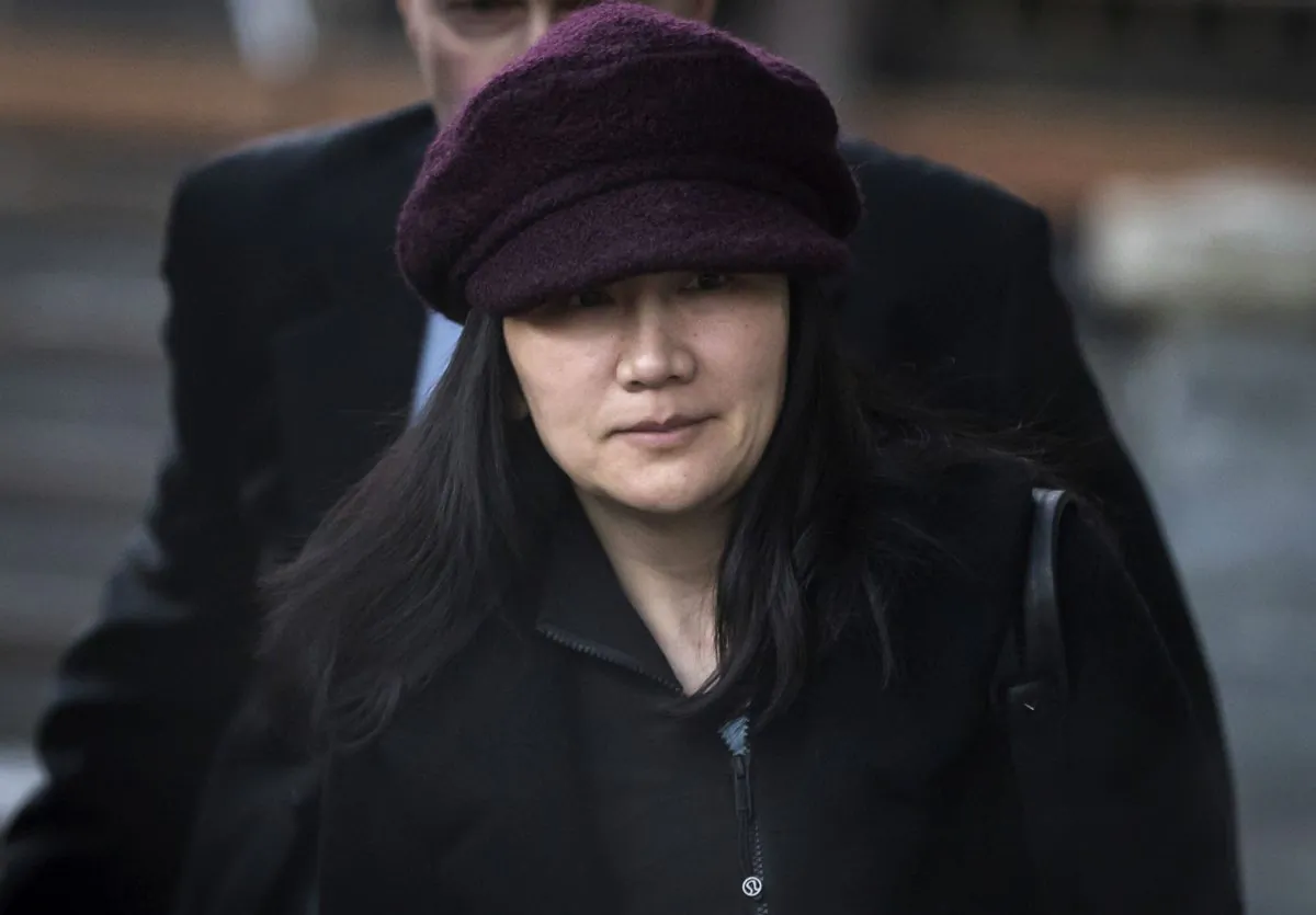 In this Jan. 29, 2019, file photo, Huawei chief financial officer Meng Wanzhou leaves her home to attend a court appearance in Vancouver, British Columbia. (Darryl Dyck/The Canadian Press via AP, File)