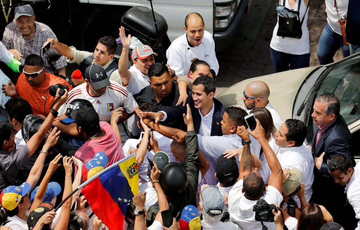 Venezuelan interim President Juan Guaido greets supporters during a rally against illegitimate socialist dictator Nicolas Maduro's government in Caracas on March 4, 2019. (Manaure Quintero/Reuters)