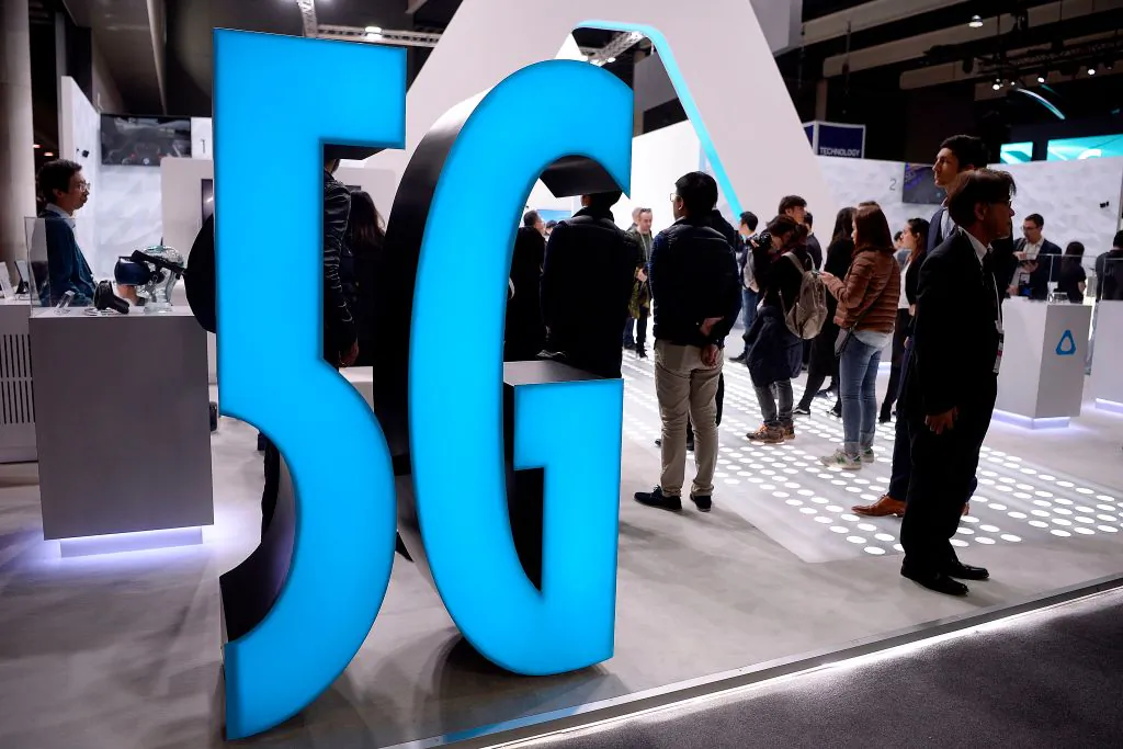 A 5G sign is displayed at a stand at the Mobile World Congress (MWC) in Barcelona on Feb. 25, 2019. (Josep Lago/AFP/Getty Images)