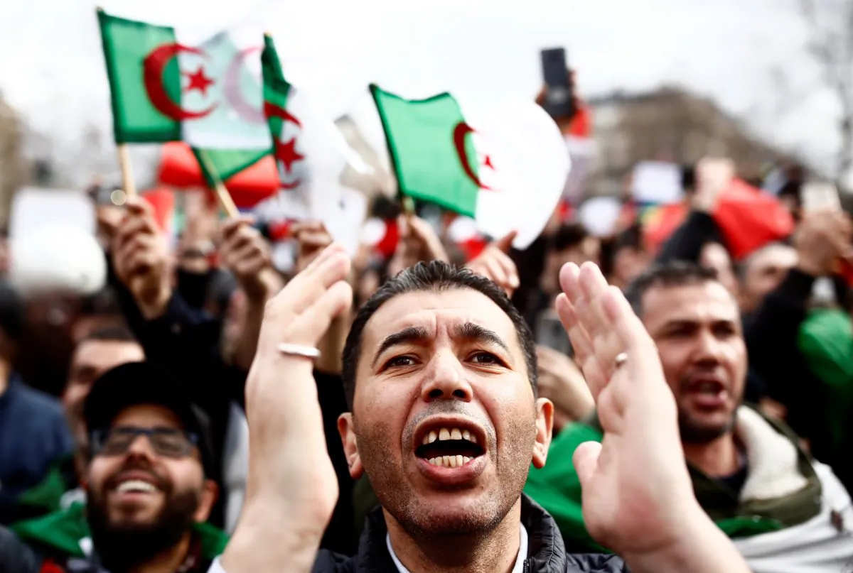 Demonstrators gather near the Monument to the Republic during a protest against Algerian President Abdelaziz Bouteflika seeking a fifth term in a presidential election set  in Paris, France, on Mar. 3, 2019. (Christian Hartmann/Reuters)
