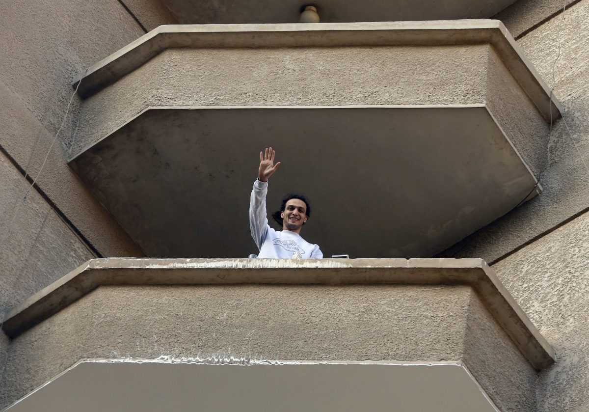 Egypt Photojournalist Mahmoud Abu Zaid waves
