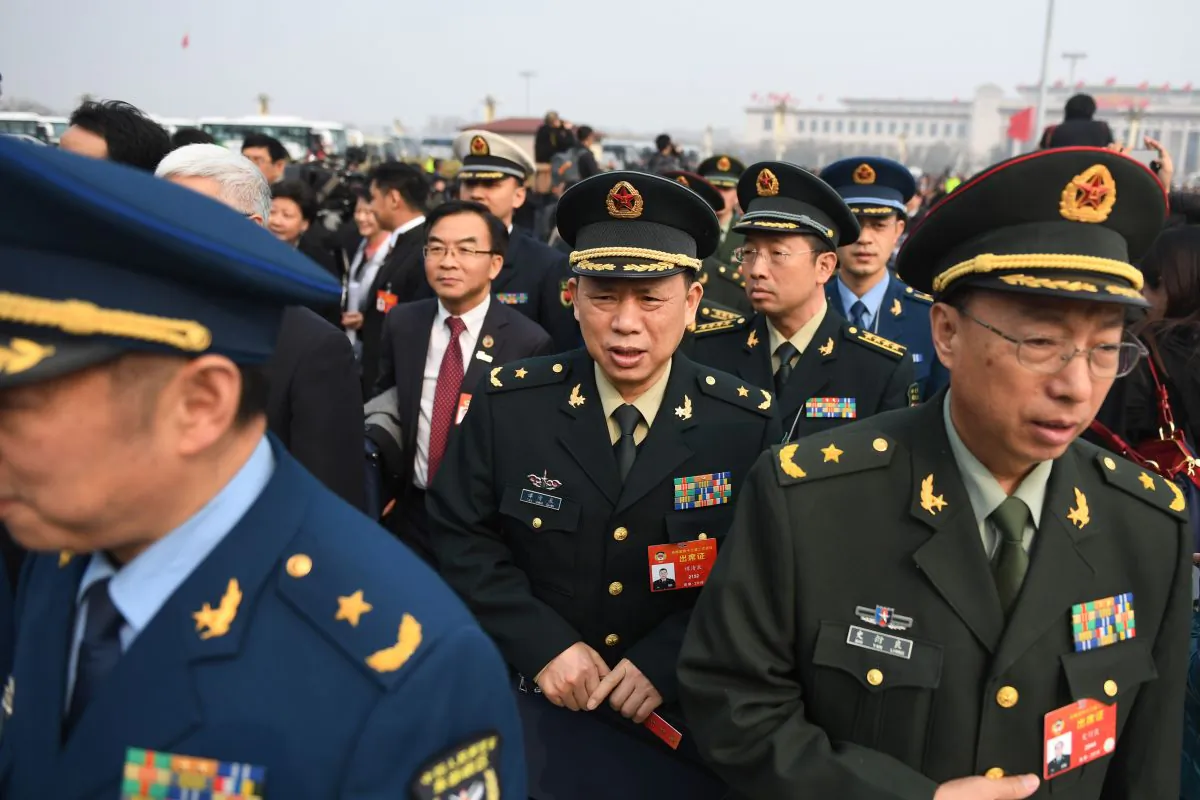 Military delegates arrive to attend the opening session of the Chinese People's Political Consultative Conference (CPPCC) at the Great Hall of the People in Beijing on March 3, 2019. (GREG BAKER/AFP/Getty Images)