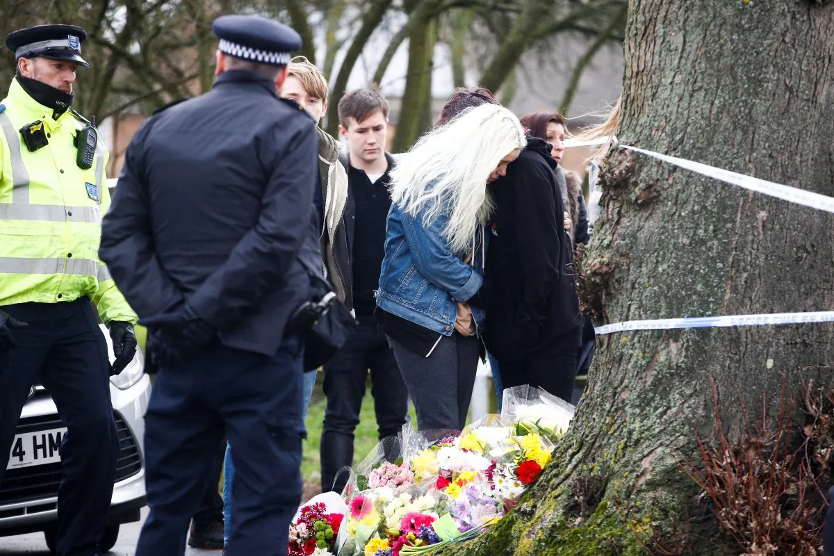 People visit a site near to where 17-year-old Jodie Chesney was killed, at the Saint Neots Play Park in Harold Hill, east London, Britain March 3, 2019. REUTERS/Henry Nicholls