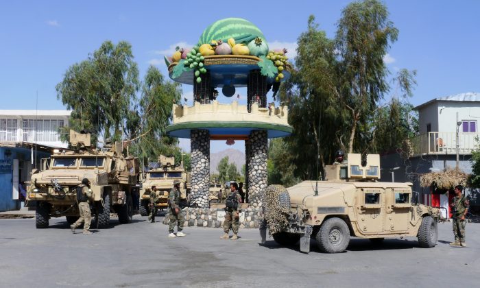 Afghan security forces patrol the town of Farah, after having driven the Taliban out, on May 19, 2018. (HAMEED KHAN/AFP/Getty Images)