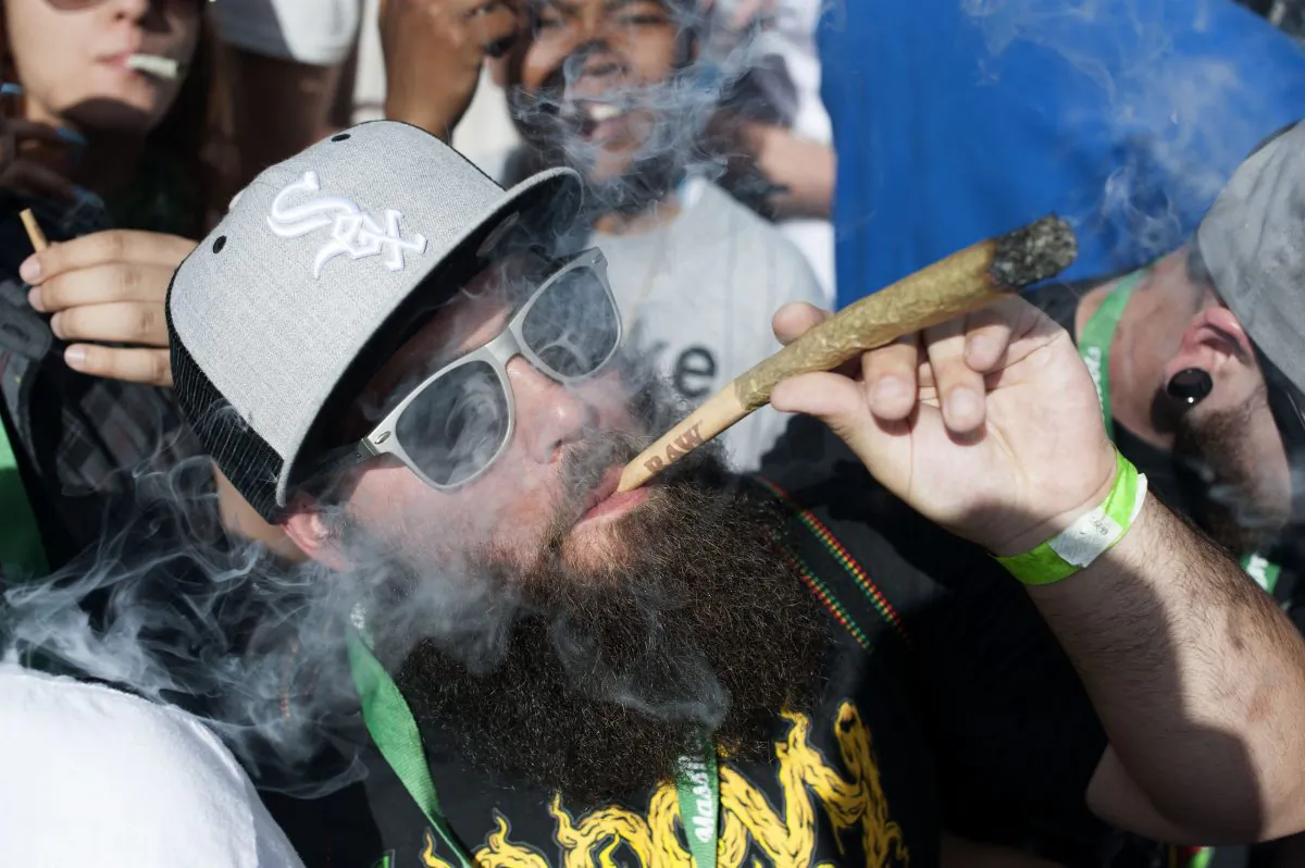 People attend the Denver 420 Rally, the world's largest celebration of both the legalization of cannabis and cannabis culture in Denver, Colorado, on May 21, 2016. (JASON CONNOLLY/AFP/Getty Images)