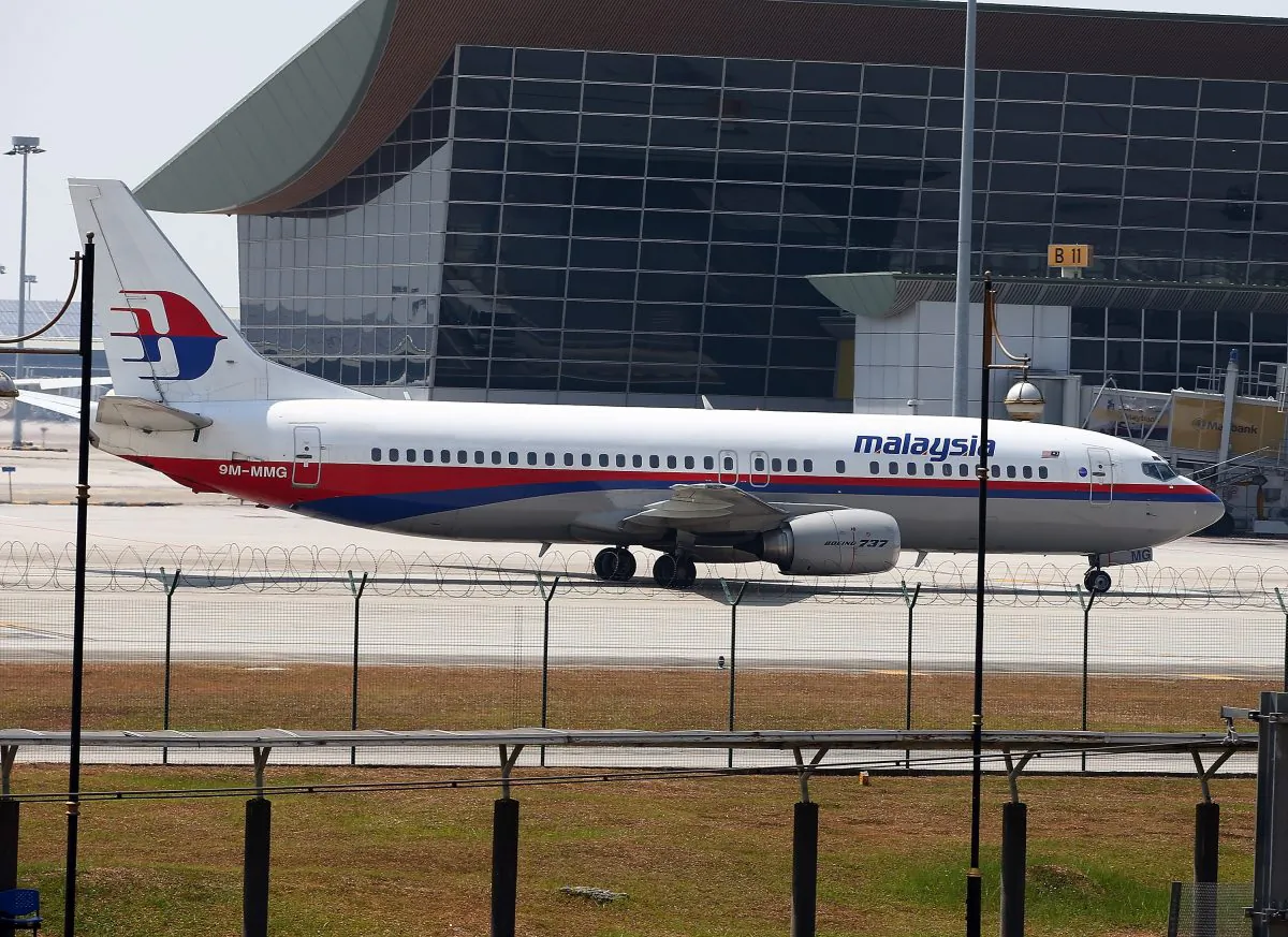 Malaysia Airline passenger jets are shown parked on the tarmac at the Kuala Lumpur International Airport in Kuala Lumpur, Malaysia on Mar. 8, 2014 (How Foo Yeen/Getty Images)
