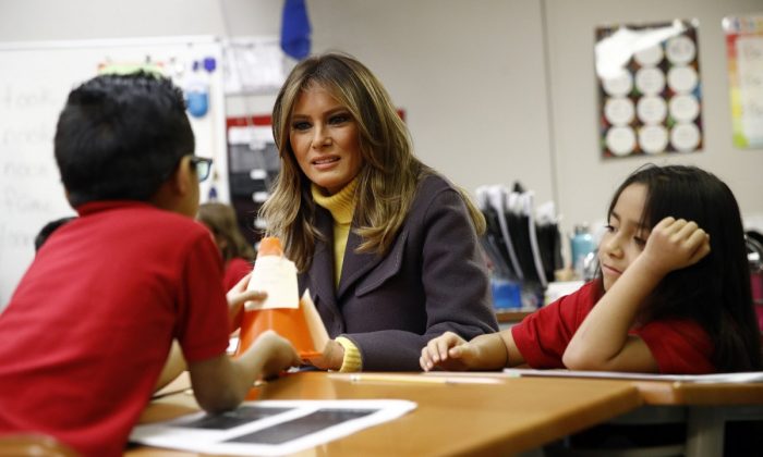 First Lady Melania Trump visits with students in a classroom at Dove School of Discovery in Tulsa, Okla., on March 4, 2019. (AP Photo/Patrick Semansky)