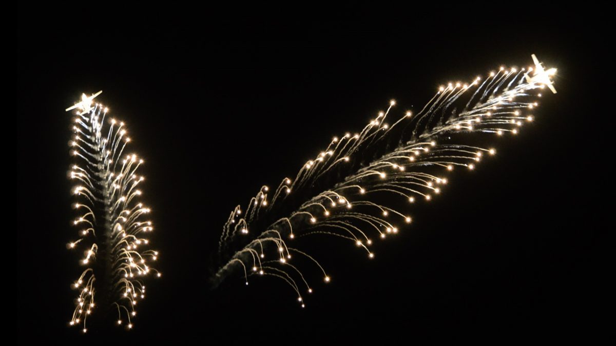 Two RAAF C-130J Hercules aircraft release fireworks into the night sky at the Australian International Airshow at Avalon Airport on March 1, 2019. (Bowen Zhang, Epoch Times)