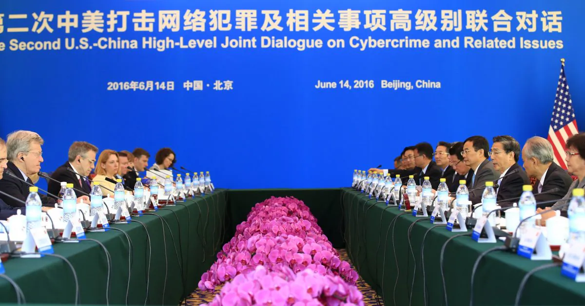 China's Minister of Public Security Guo Shengkun (3rd R) and U.S. Ambassador to China Max Baucus (2nd L) attend the second U.S.-China High-Level Joint Dialogue on Cybercrime and Related Issues at the Diaoyutai State Guesthouse in Beijing on June 14, 2016. (Jason Lee/AFP/Getty Images)