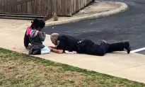 Cop Plays Games with Frightened Children on Sidewalk After False Gas Leak Alarm