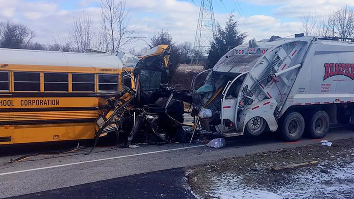 A school bus collided with a garbage truck near Aurora, Ind., on March 6, 2019. (Sgt. Stephen Wheeles/Indiana State Police via AP)