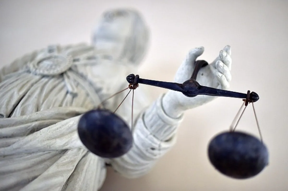  A statue of the goddess of Justice balancing the scales at Rennes' courthouse on Sept. 19, 2017. (Loic Venance/AFP/Getty Images)