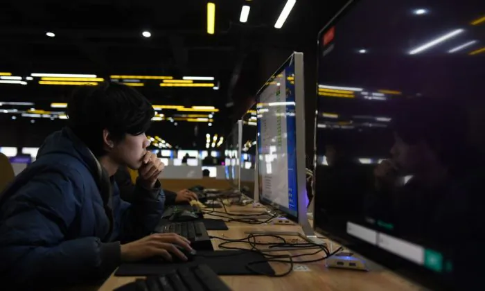 Students sit an exam in a computer room at a technical school in Jinan, in eastern China's Shandong Province on Jan. 29, 2018. (Greg Baker/AFP/Getty Images)
