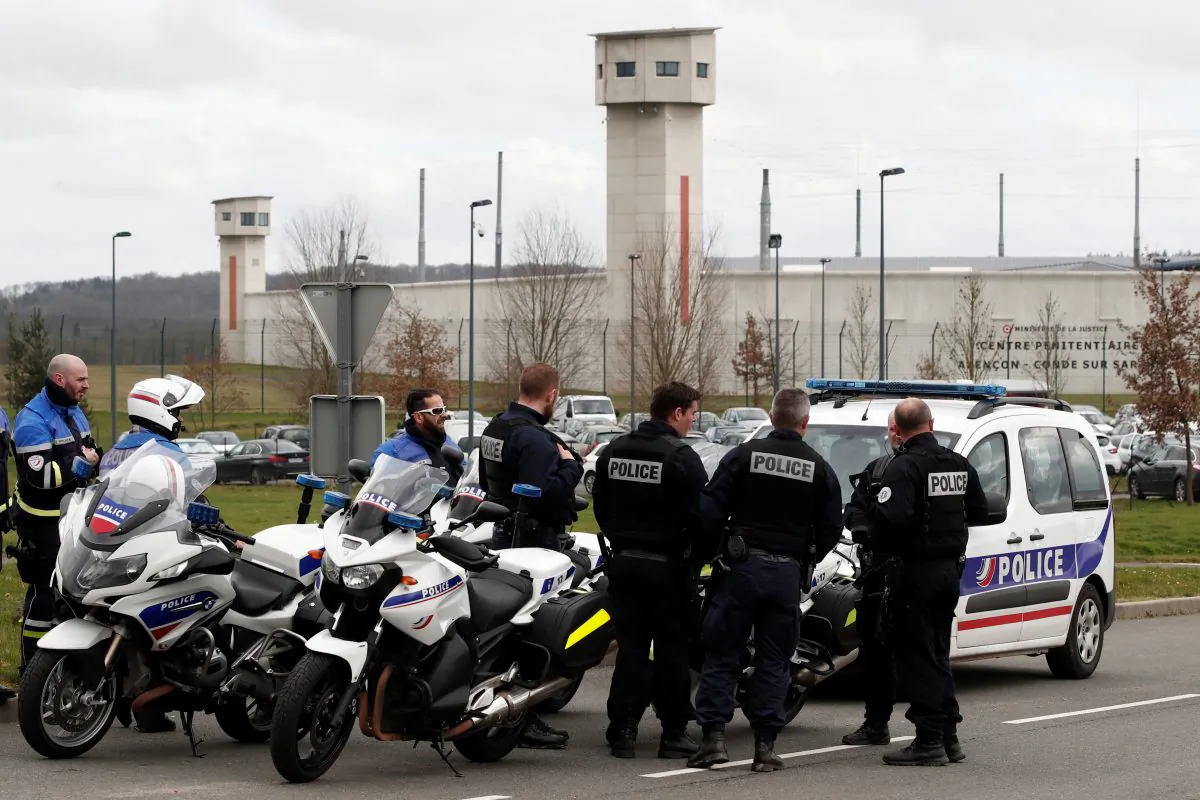 French police outside the prison where an inmate in one of France's most secure prisons stabbed two guards with a knife in Condé-sur-Sarthe, France, on March 5, 2019.   (Benoit Tessier/Reuters)