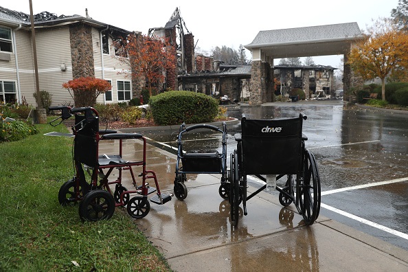 Wheelchairs sit in front of a senior living facility that was destroyed by the Camp Fire in Paradise