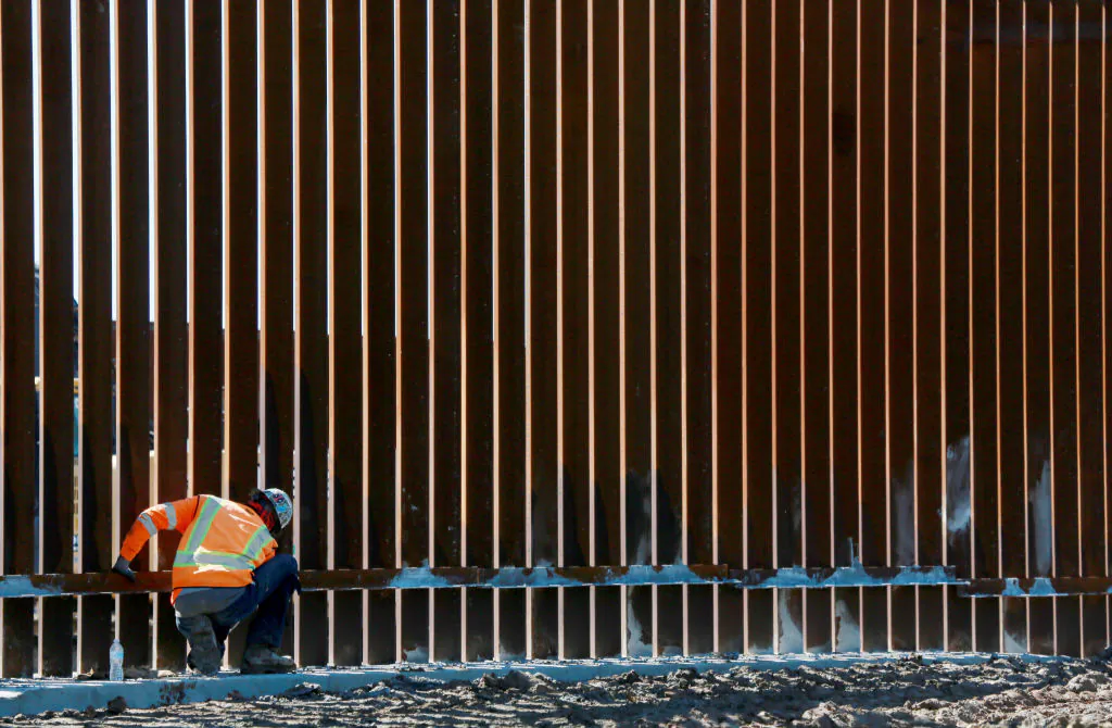 Construction workers build a secondary border wall in Otay Mesa, Calif., on Feb. 22, 2019. (Sandy Huffaker/Getty Images)