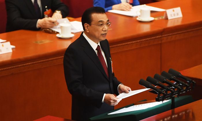 Chinese Premier Li Keqiang speaks during the opening session of the National Peoples Congress on March 5, 2019. (Greg BAKER/AFP/Getty Images)