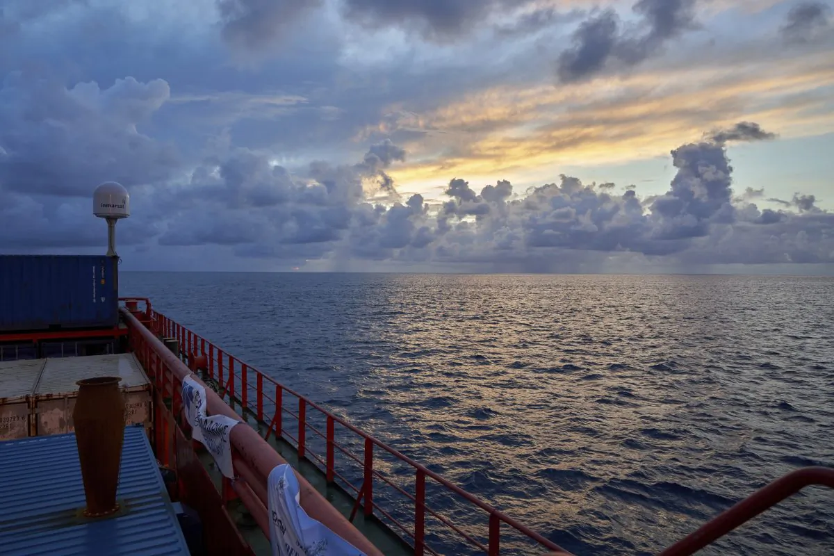 Sun rises near the tiny atoll of Alphonse where scientists onboard the Ocean Zephyr began exploring the depths of the Indian Ocean, Thursday March 7, 2019. The expedition is led by the Britain-based Nekton, an independent, non-profit research institute that works with the University of Oxford to increase scientific understanding of the oceans. (AP Photo/David Keyton)