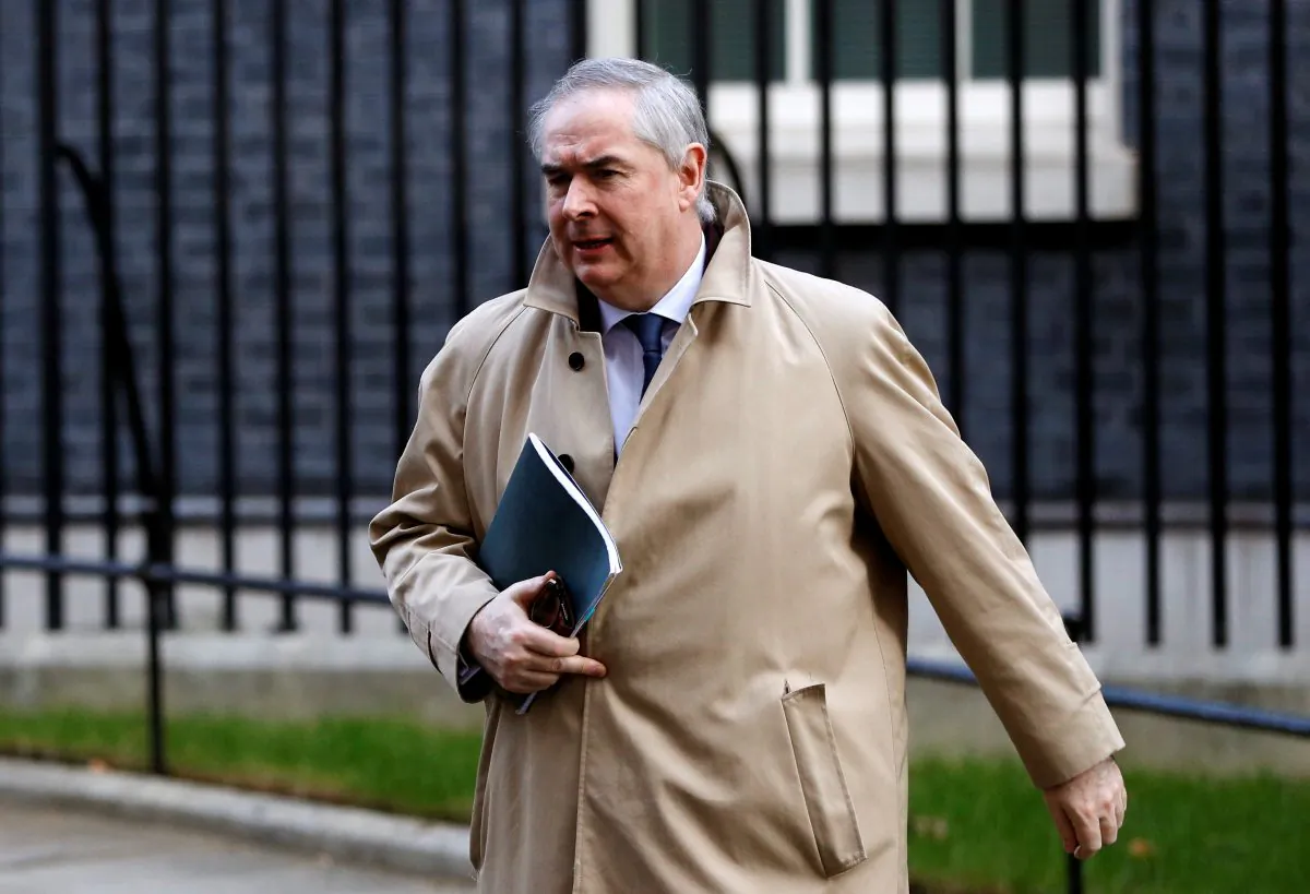 FILE PHOTO: Britain's Attorney General Geoffrey Cox is seen outside of Downing Street in London, Britain, February 27, 2019. REUTERS/Peter Nicholls