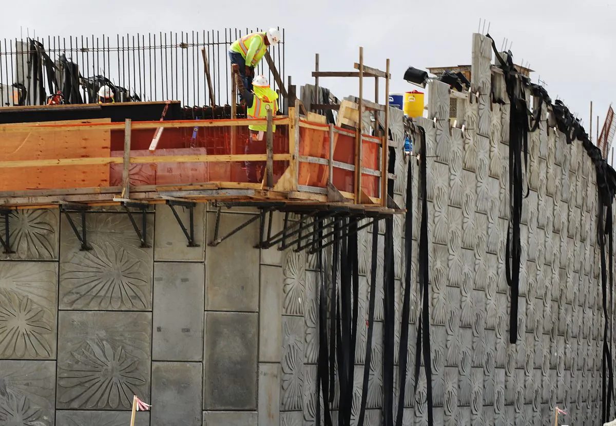 Construction workers build along State Road 836 in Miami, Florida, on Feb. 12, 2018. (Joe Raedle/Getty Images)