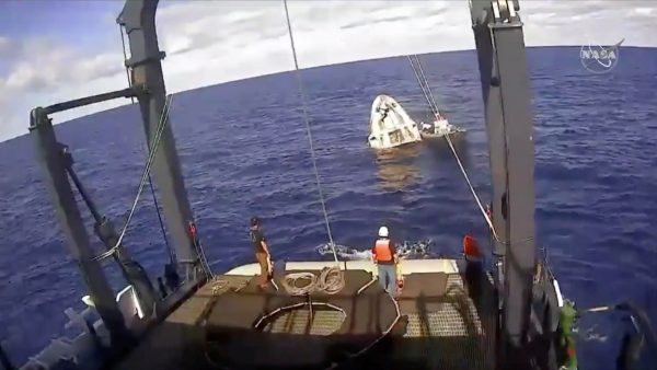 SpaceX unmanned capsule splashing into Atlantic Ocean