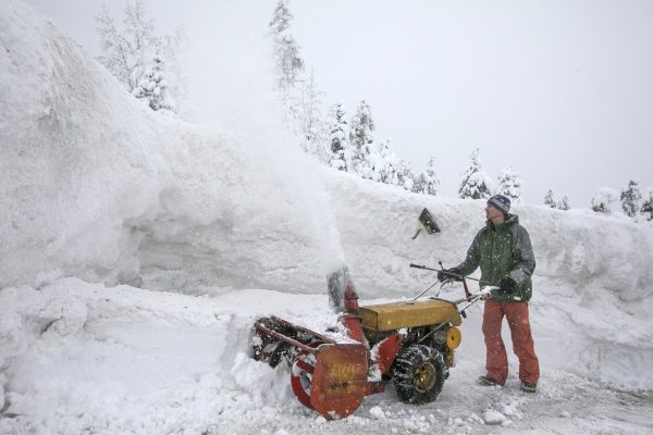 Andy Richmond clears snow