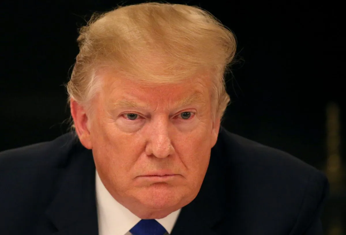 President Donald Trump participates in an American Workforce Policy Advisory Board meeting in the White House State Dining Room in Washington, DC on March 6, 2019. (Leah Millis/Reuters)