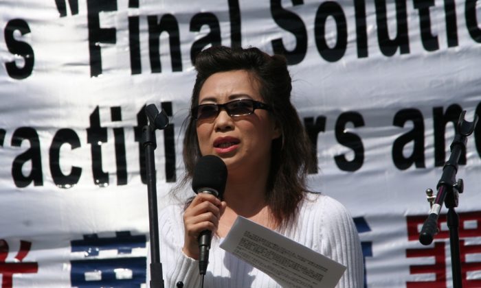 Annie (alias), ex-wife of a brain surgeon who removed organs from thousands of Falun Dafa prisoners of conscience in China in the early 2000s, speaks at a press conference in Washington, D.C., on April 20, 2006. (The Epoch Times)
