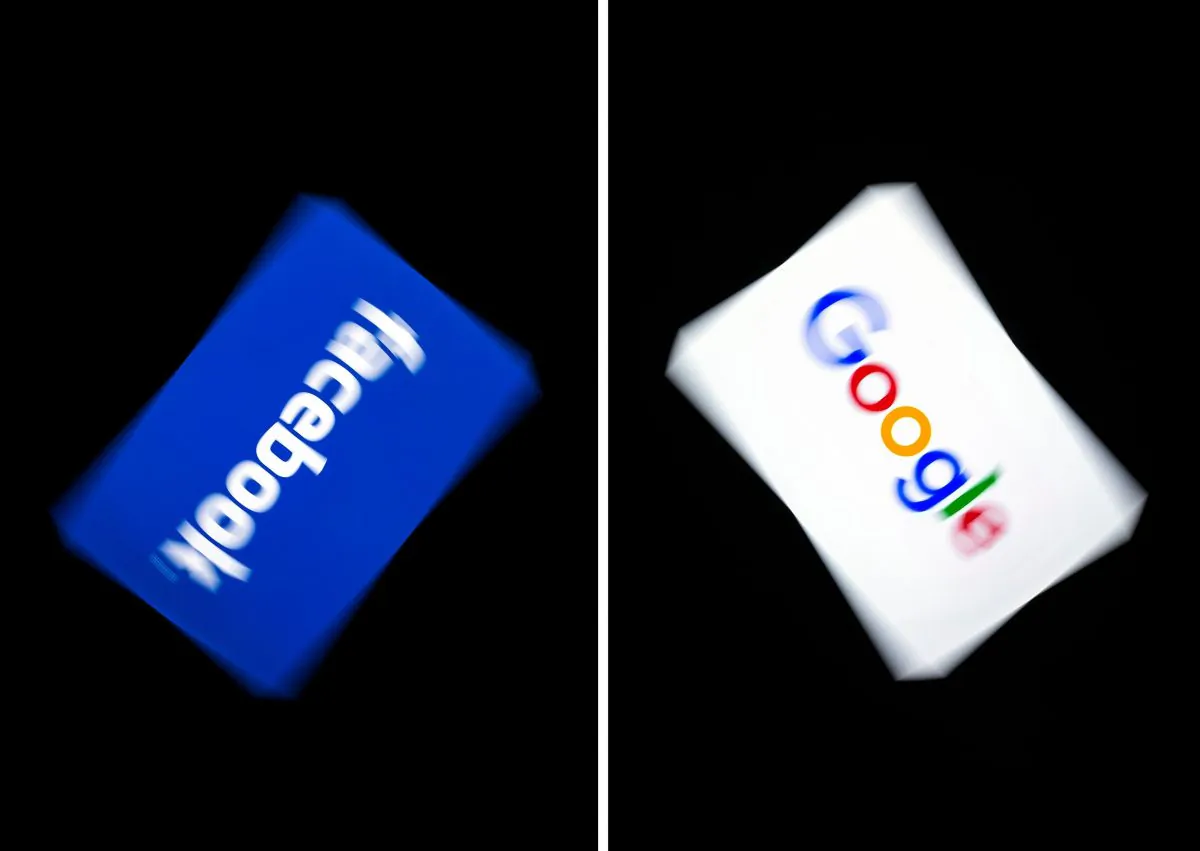 The logos of Google and Facebook displayed on a tablet in Paris, on Feb. 18, 2019. (Lionel Bonaventure/AFP/Getty Images)