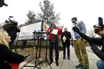 Singer R. Kelly center, speaks to the media while his attorney Steve Greenberg right,