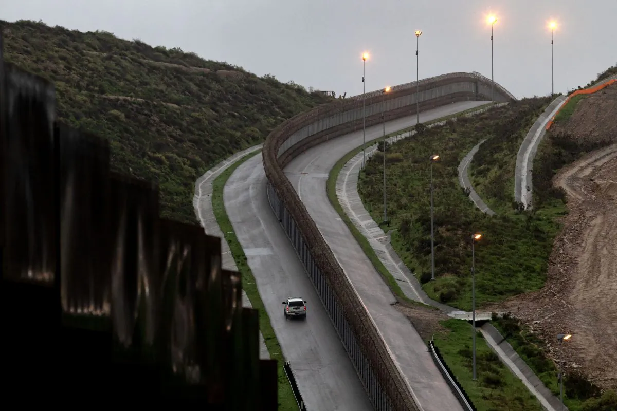 A Border Patrol unit near a section of reinforced US-Mexico border fence, on Feb. 14, 2019, from Tijuana, Baja California State, Mexico.(Guillermo Arias/AFP/Getty Images)