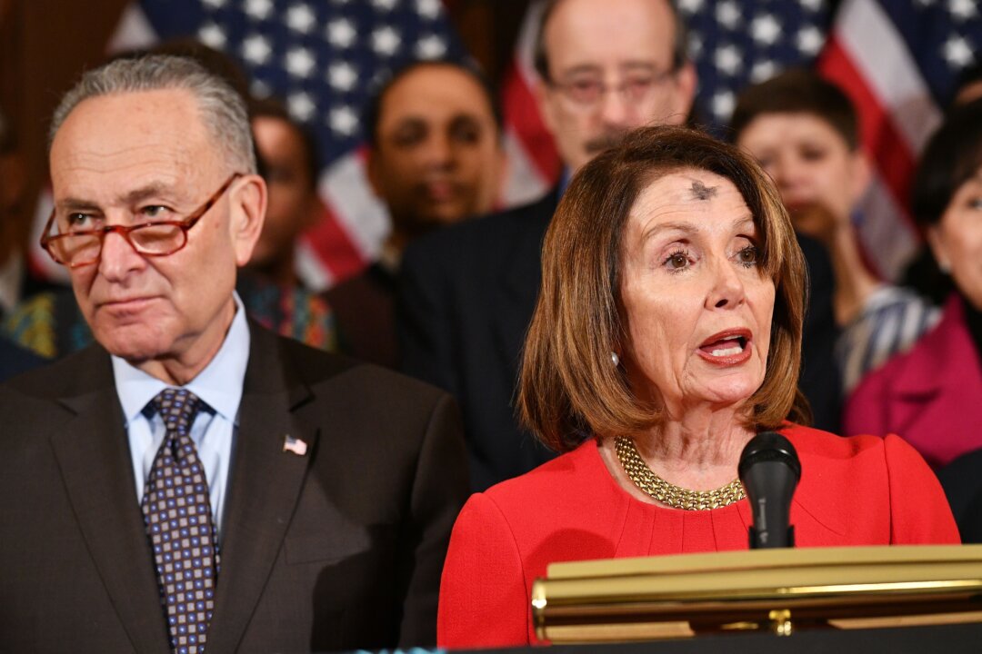 House Speaker Nancy Pelosi (R) with Senate Majority Leader Chuck Schumer (L) in the Rayburn Room of the U.S. Capitol in Washington, on March 6, 2019. (Mandel Ngan/AFP/Getty Images)
