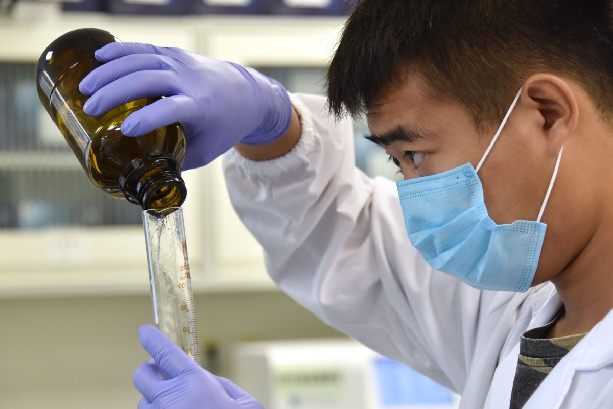 A technician works at a DNA lab in Beijing