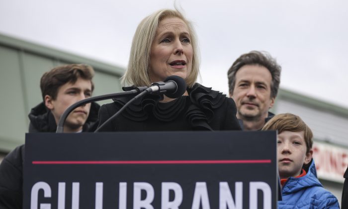 Surrounded by her family, Sen. Kirsten Gillibrand (D-N.Y.) announces that she will run for president in 2020 outside the Country View Diner in Troy, N.Y., on Jan. 16, 2019. (Drew Angerer/Getty Images)