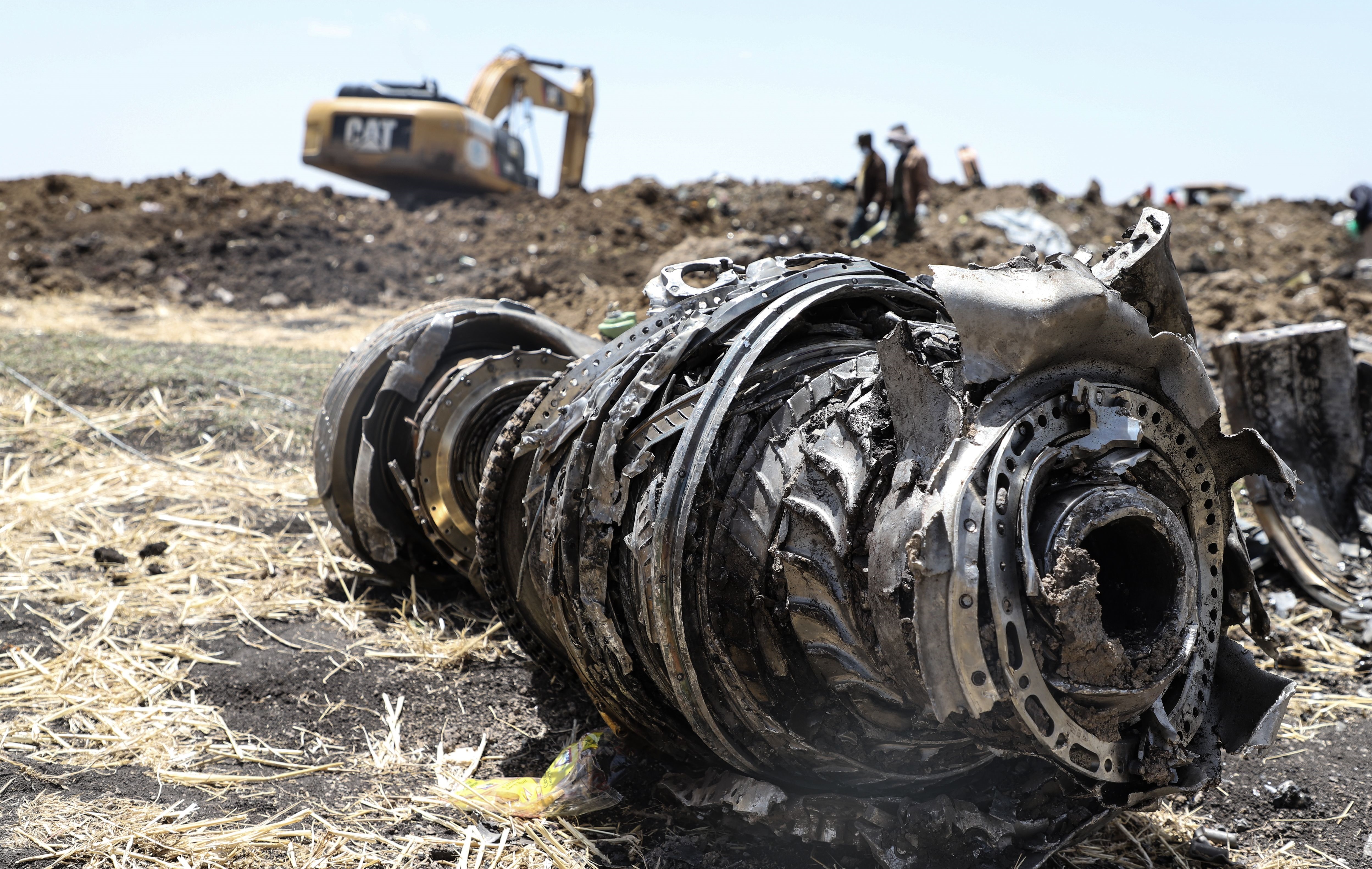 A photo shows debris of the crashed airplane of Ethiopia Airlines, near Bishoftu, a town some 60 kilometres southeast of Addis Ababa, Ethiopia