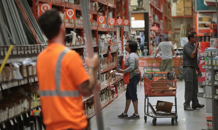Customers shop at a Home Depot store in Chicago, Ill., on July 26, 2017. (Scott Olson/Getty Images)