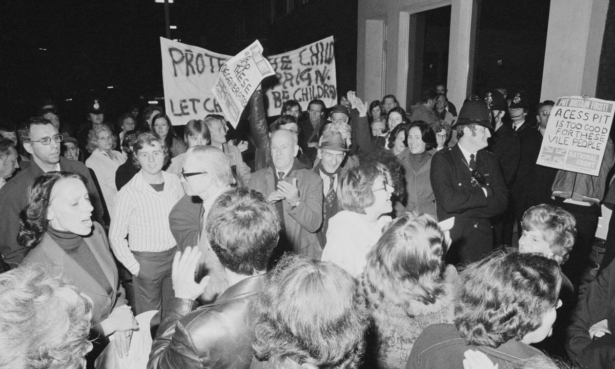 Protesters and police outside Conway Hall