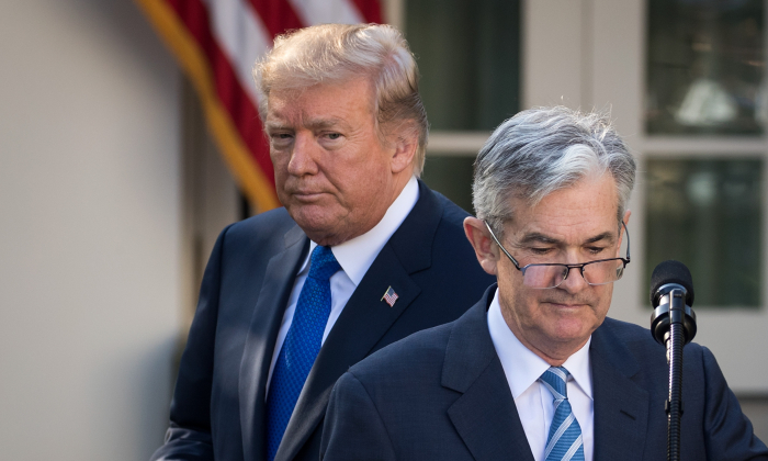 U.S. President Donald Trump looks on as Jerome Powell, his nominee for the chairman of the Federal Reserve, takes to the podium during a press event at the White House in Washington on Nov. 2, 2017. (Drew Angerer/Getty Images)