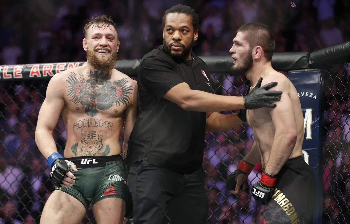 Conor McGregor (L) and Khabib Nurmagomedov are separated during a UFC 229 mixed martial arts bout in Las Vegas on Oct. 6, 2018. (John Locher/AP Photo)