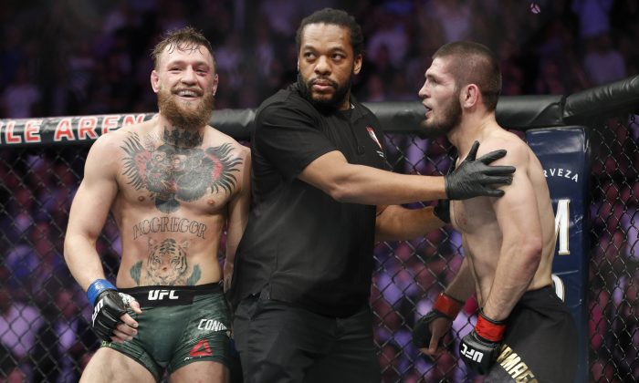 Conor McGregor (L) and Khabib Nurmagomedov are separated during a UFC 229 mixed martial arts bout in Las Vegas on Oct. 6, 2018. (John Locher/AP Photo)