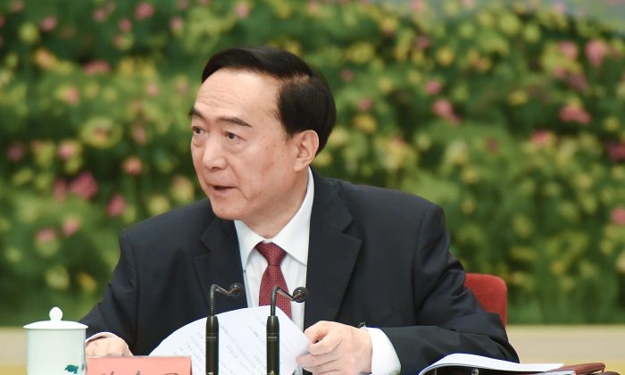 Chen Quanguo, CCP secretary of Xinjiang, attends a meeting of the 19th Communist Party Congress at the Great Hall of the People on October 19, 2017 in Beijing, China. Chen developed the so-called “vocational education centres” that detains million of Uighurs and other Muslim minorities.  (Etienne Oliveau/Getty Images)
