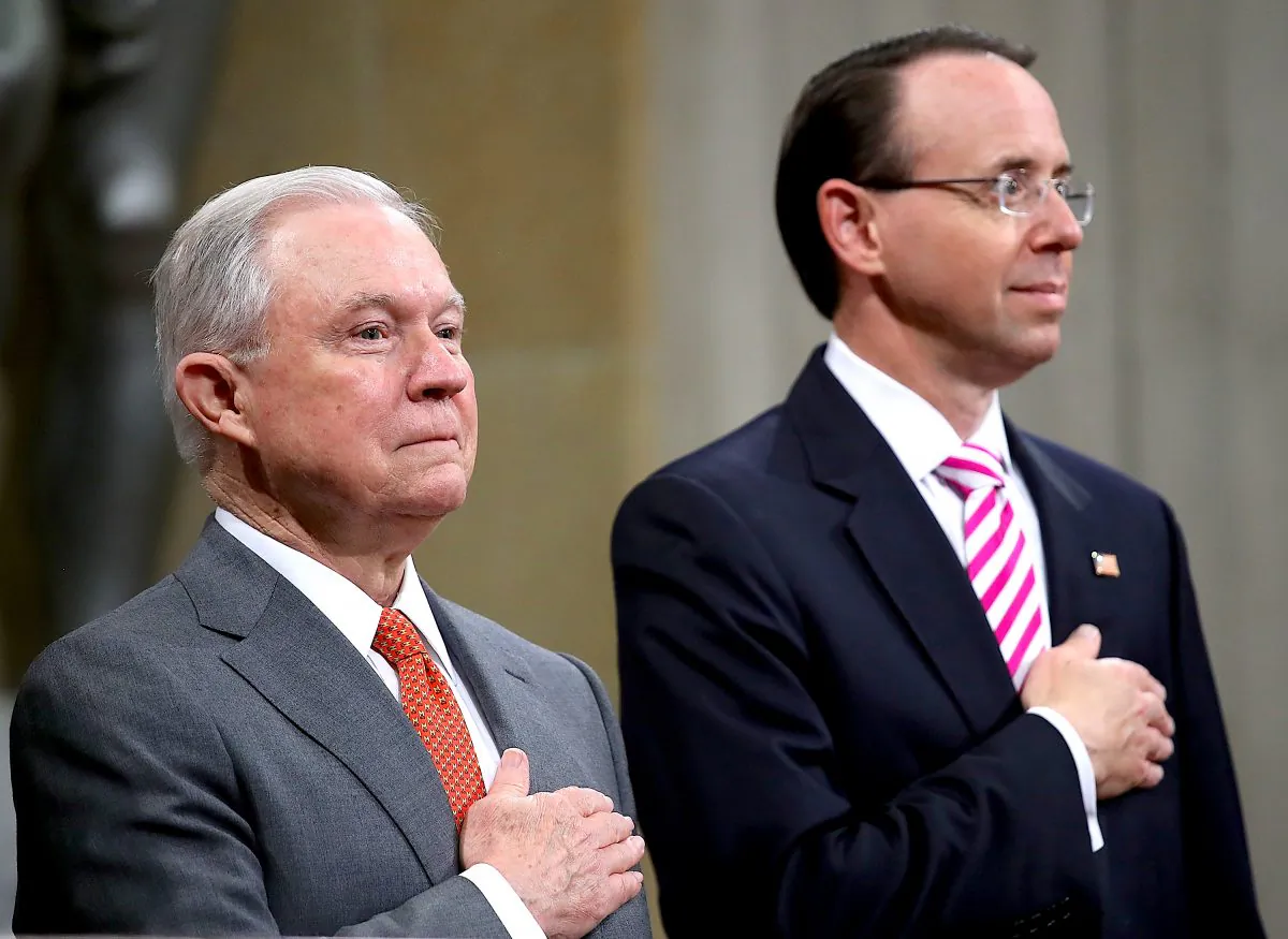 Attorney General Jeff Sessions (L) and Deputy Attorney General Rod Rosenstein (R) attend the Religious Liberty Summit at the Department of Justice in Washington on July 30, 2018. (Win McNamee/Getty Images)